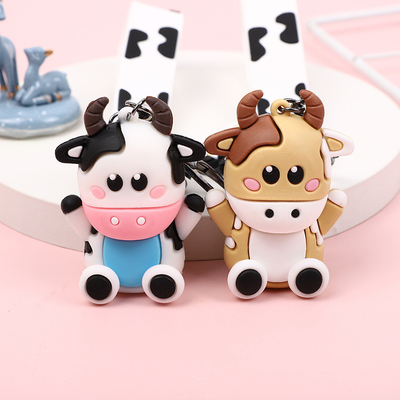 Harga yang bagus Keychain sapi kartun silikon untuk tas ransel wanita dan gantungan mobil on line